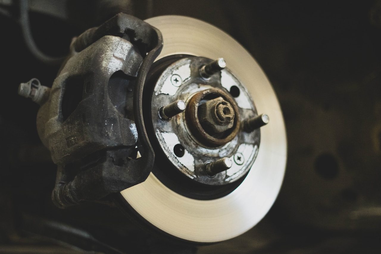 Disc brake assembly showing rotor and caliper — the core components of a classic car braking system