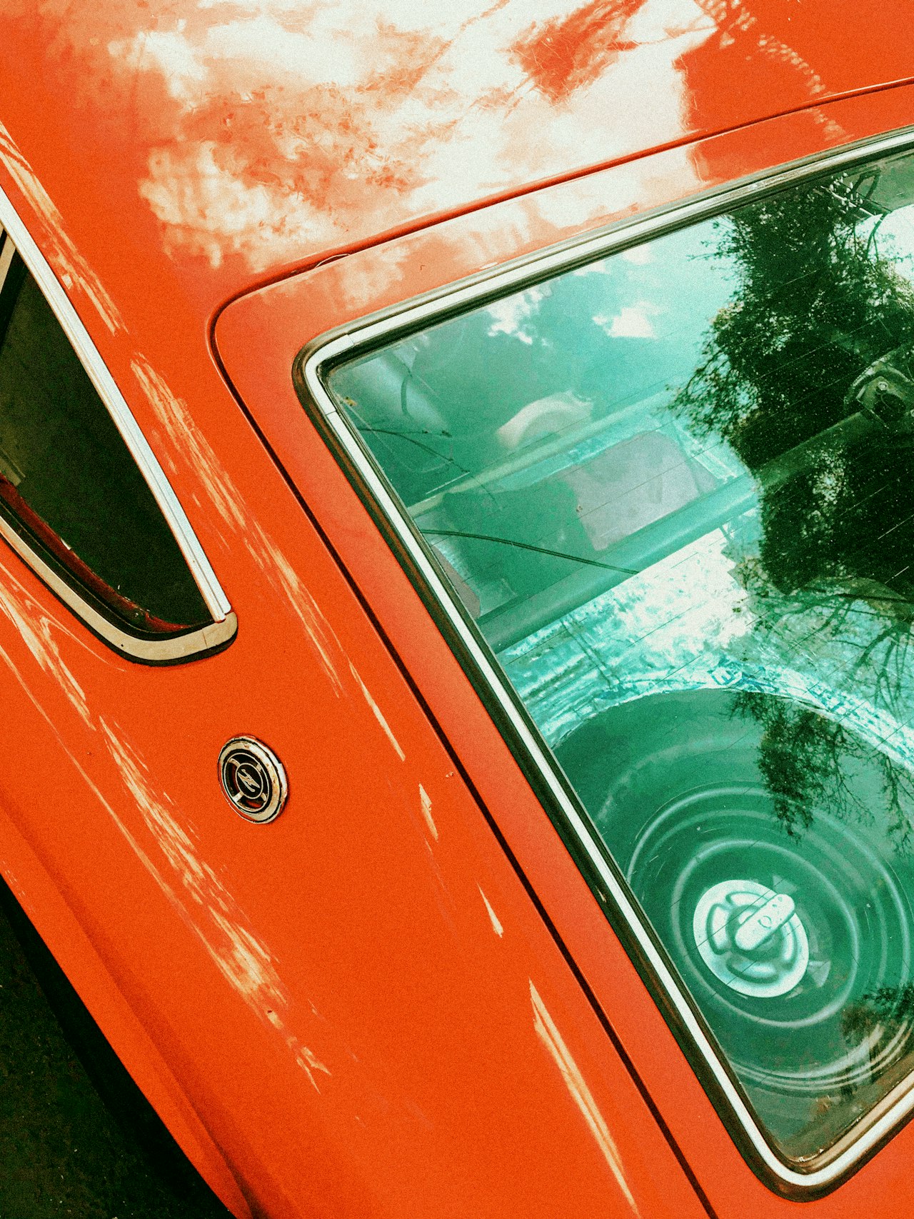Red Datsun 240Z classic sports car, showcasing the iconic Z-car design