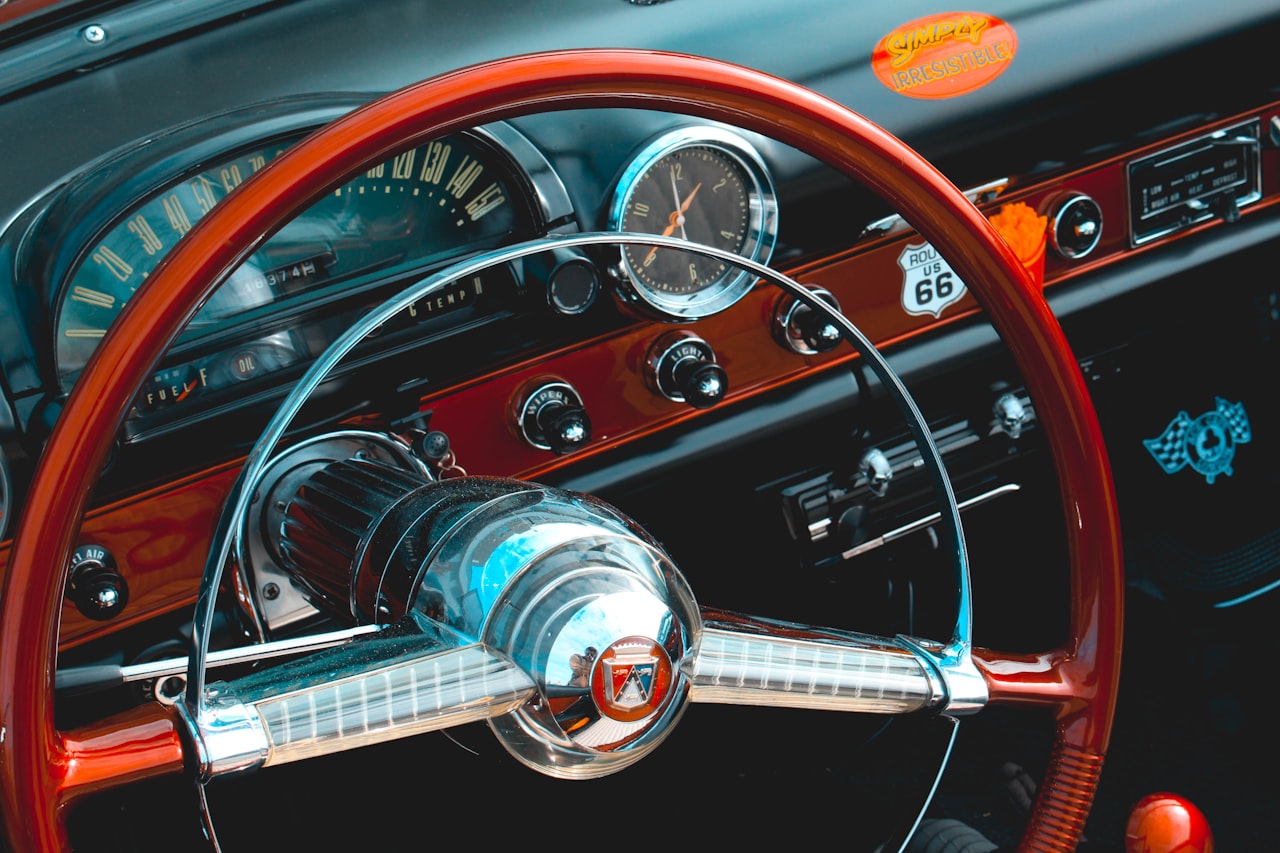 Classic car interior with leather steering wheel