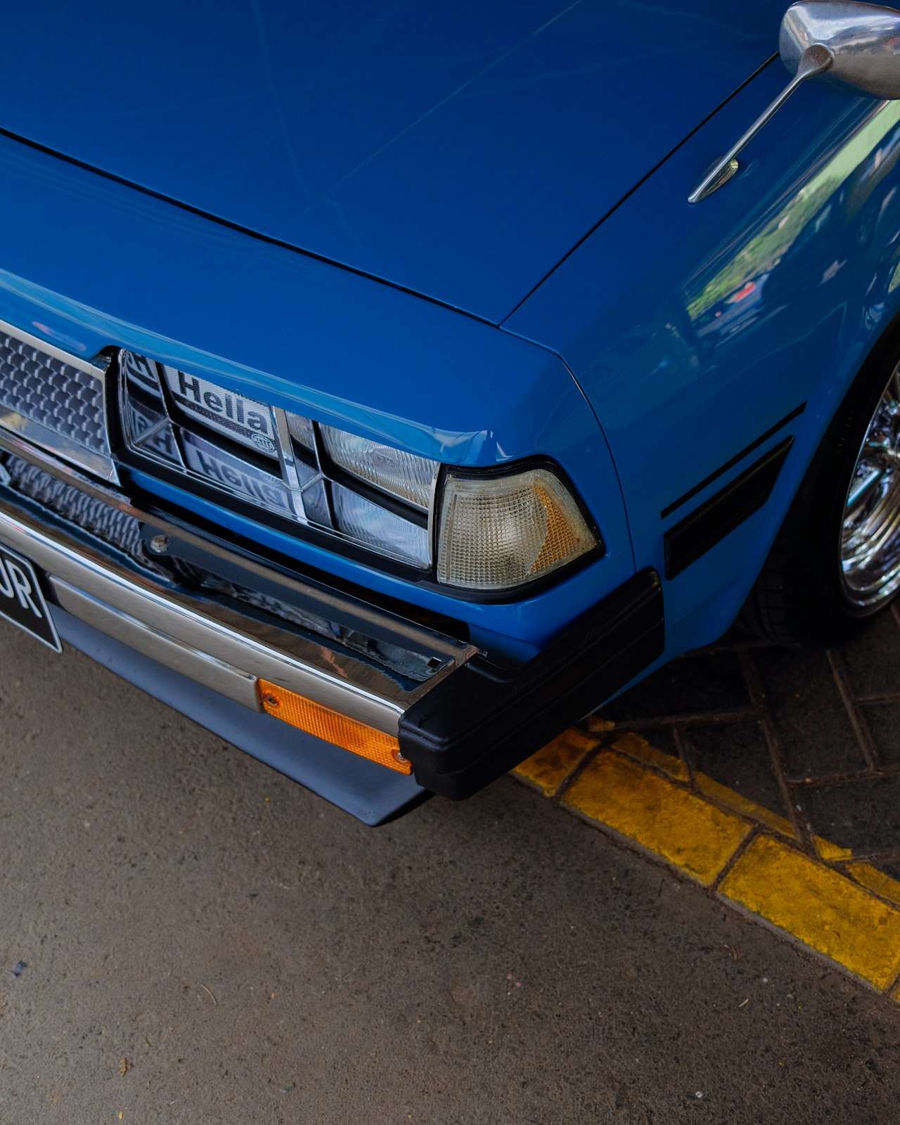 Front view of a vintage blue classic car